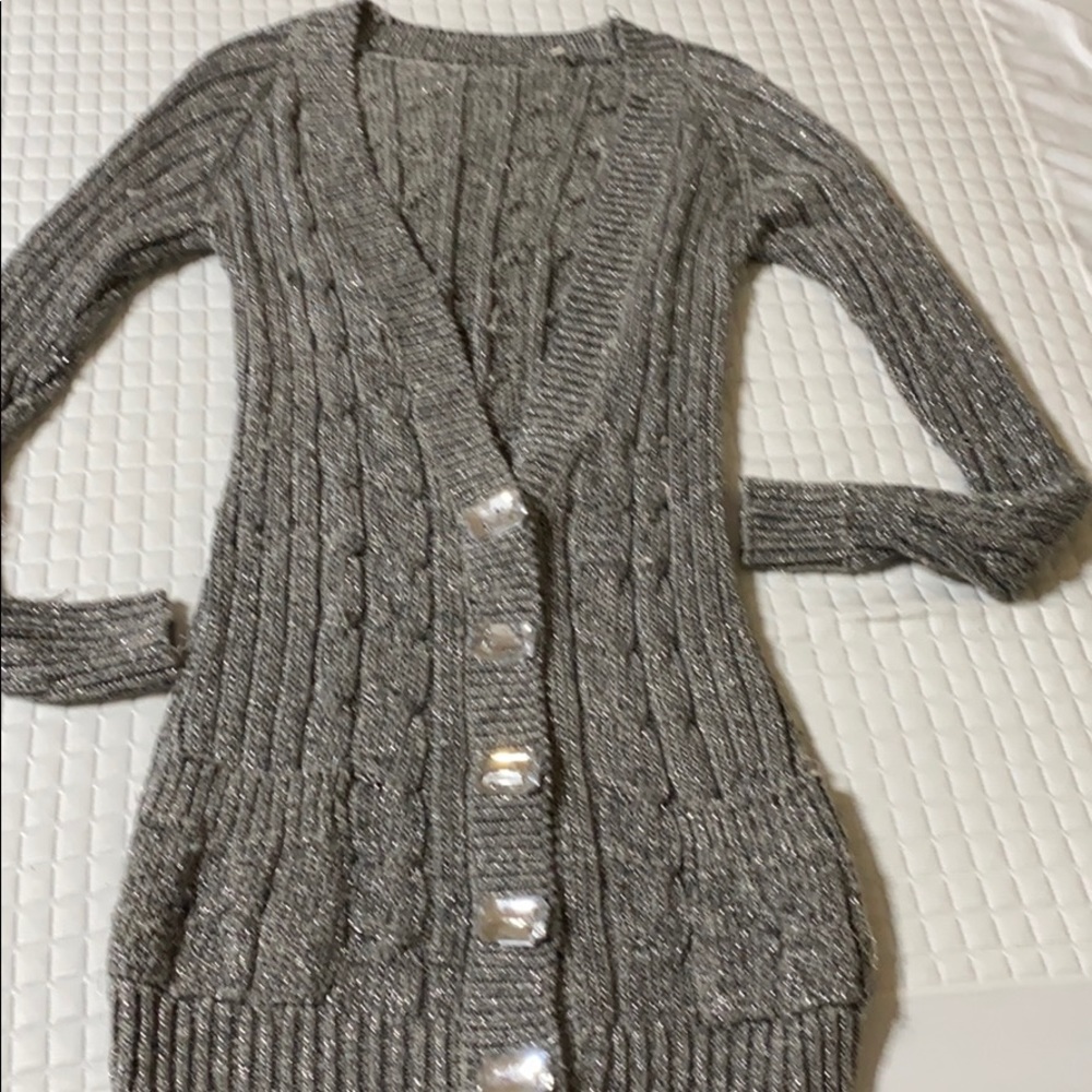 Silver knitted fitted gray and silver sweater.